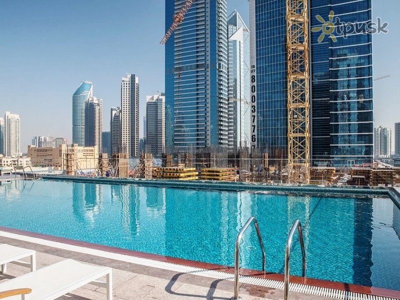 Pullman dubai downtown. Дубай Даунтаун фото туристов. Ps5 в Дубае полный комплект.