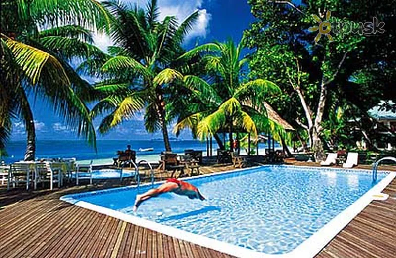 Фото отеля Indian Ocean Lodge 3* о. Праслин Сейшельские о-ва экстерьер и бассейны