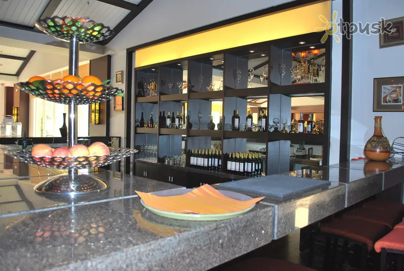 Фото отеля Shengyi Holiday Villa Hotel & Suites Sanya 5* о. Хайнань Китай бари та ресторани