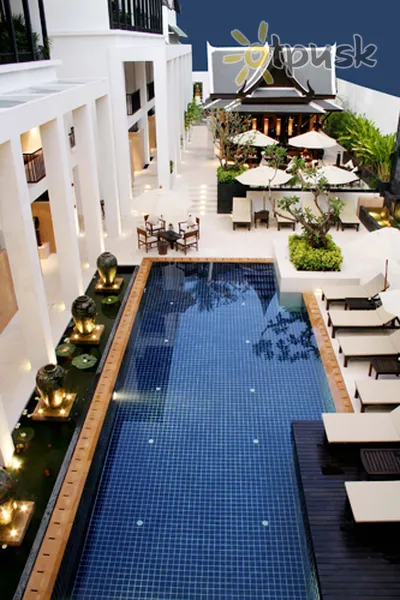 Фото отеля Outrigger Surin Beach Resort 4* о. Пхукет Таїланд екстер'єр та басейни