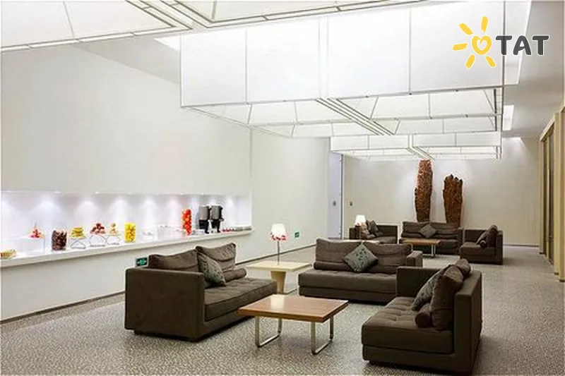 Фото отеля Holiday Inn Minzuyuan 4* Пекін Китай лобі та інтер'єр