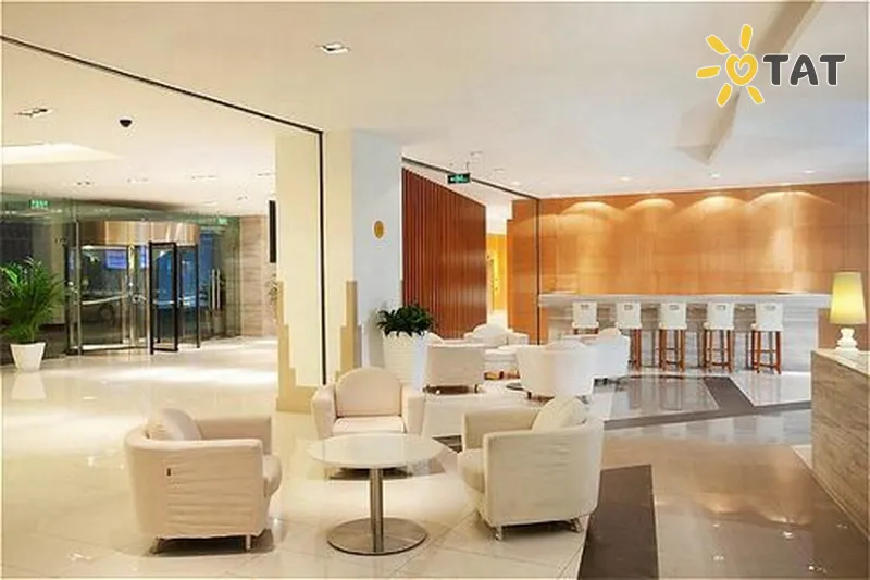 Фото отеля Holiday Inn Minzuyuan 4* Пекін Китай лобі та інтер'єр