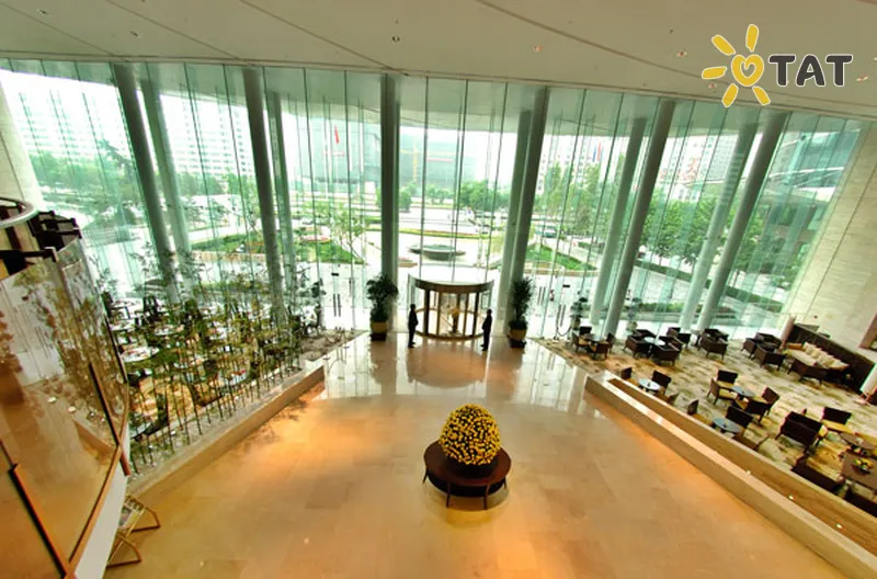 Фото отеля Jianguo Garden 4* Пекін Китай лобі та інтер'єр