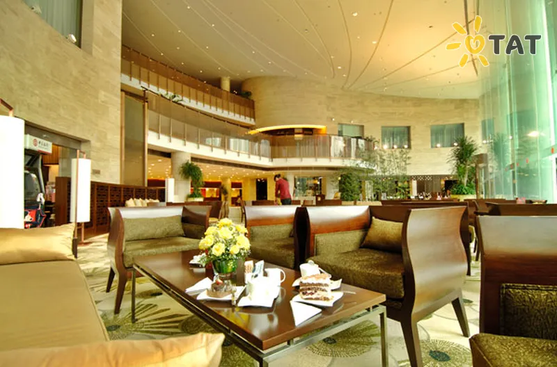 Фото отеля Jianguo Garden 4* Пекін Китай лобі та інтер'єр