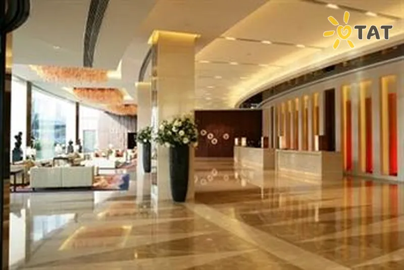 Фото отеля Jing Guang New World 5* Пекін Китай лобі та інтер'єр