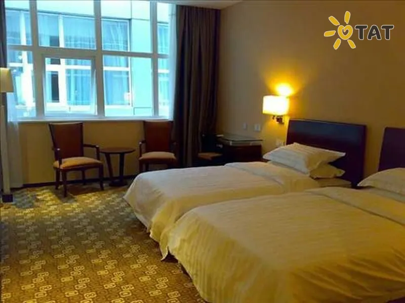 Фото отеля Tailong Plaza 3* Пекін Китай номери