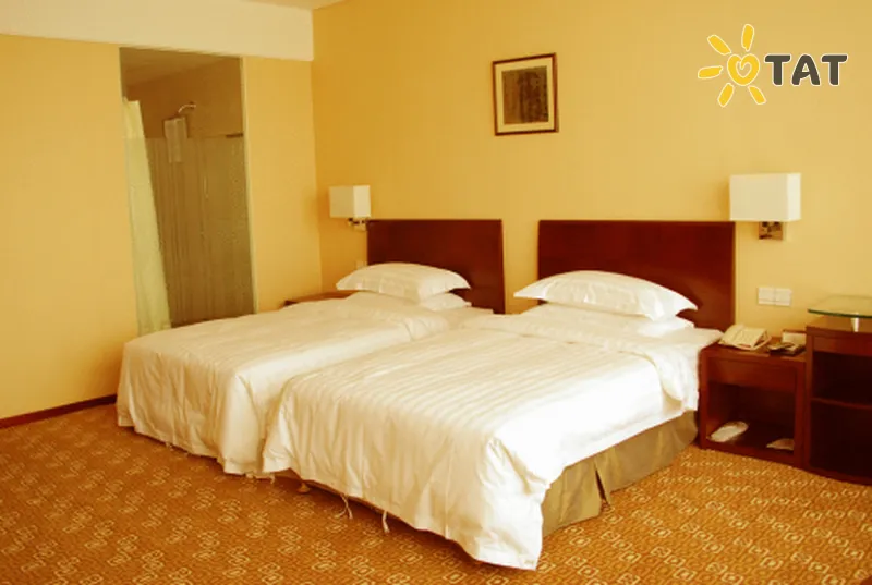 Фото отеля Tailong Plaza 3* Пекін Китай номери