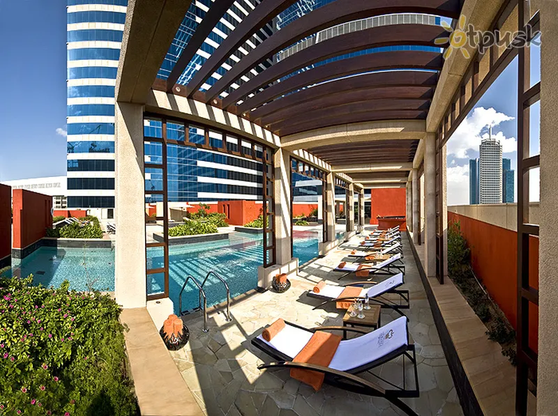 Фото отеля The H Hotel 5* Дубай ОАЭ экстерьер и бассейны
