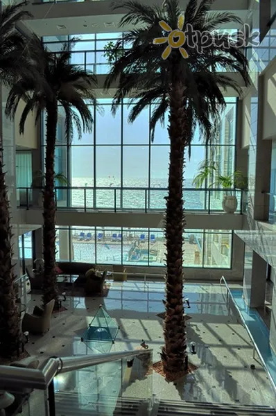 Фото отеля Orchid Okeanos Boutique Hotel 4* Герцлия Израиль лобби и интерьер