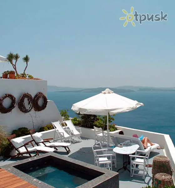 Фото отеля Ikies Traditional Houses 4* о. Санторини Греция экстерьер и бассейны
