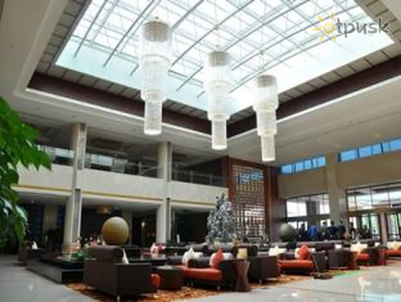 Фото отеля Huaxi Hotel Penglai 5* Яньтай Китай лобби и интерьер