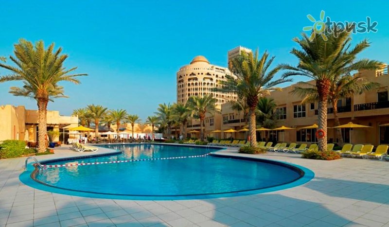 Фото отеля Al Hamra Village Golf & Beach Resort 4* Рас Аль-Хайма ОАЭ экстерьер и бассейны