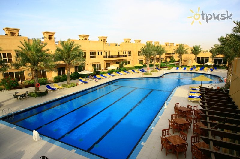 Фото отеля Al Hamra Village Golf & Beach Resort 4* Рас Аль-Хайма ОАЭ экстерьер и бассейны
