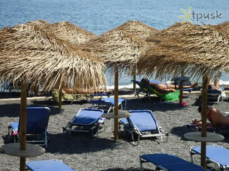 Фото отеля Dolphins Apartments 3* о. Санторіні Греція пляж