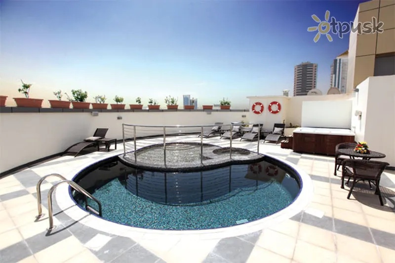 Фото отеля Xclusive Maples Hotel Apartments 3* Дубай ОАЭ экстерьер и бассейны