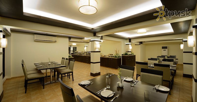 Фото отеля Deltin Suites 4* Северный Гоа Индия бары и рестораны