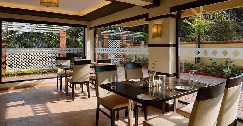 Фото отеля Deltin Suites 4* Северный Гоа Индия бары и рестораны