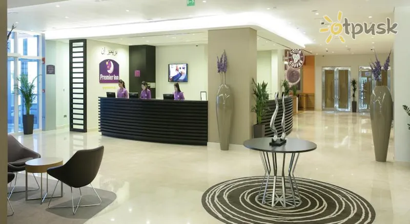 Фото отеля Premier Inn Abu Dhabi International Airport 3* Абу Даби ОАЭ лобби и интерьер