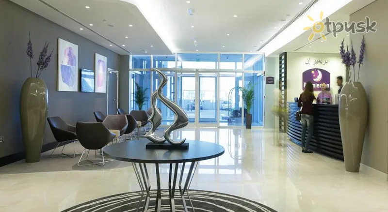 Фото отеля Premier Inn Abu Dhabi International Airport 3* Абу Даби ОАЭ лобби и интерьер