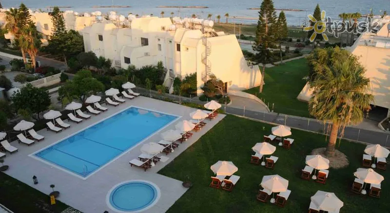 Фото отеля Frixos Suites Hotel apts 3* Ларнака Кіпр екстер'єр та басейни