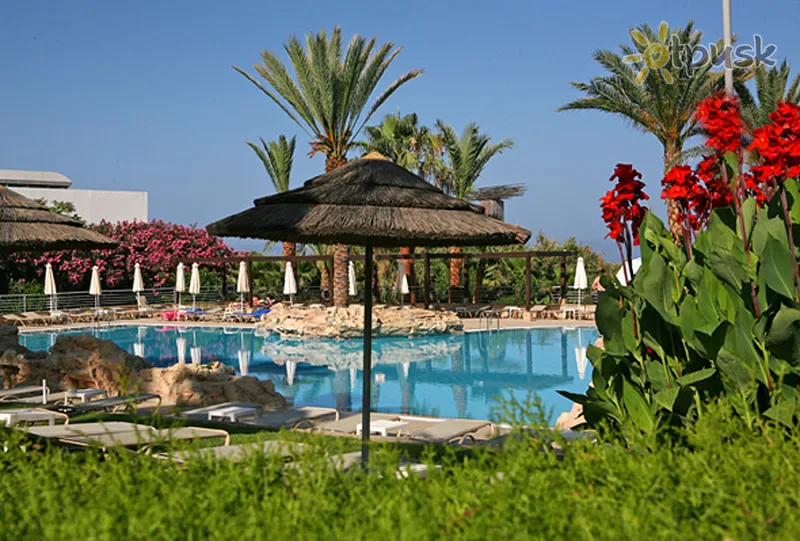Фото отеля St. George Hotel Spa & Golf Beach Resort 4* Пафос Кипр экстерьер и бассейны