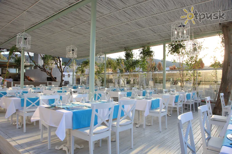 Фото отеля Grand Yazici Torba Beach Club 4* Бодрум Туреччина бари та ресторани
