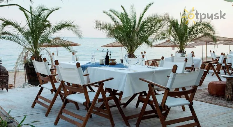 Фото отеля Thracian Cliffs Golf & Beach Resort 4* Каварна Болгарія бари та ресторани