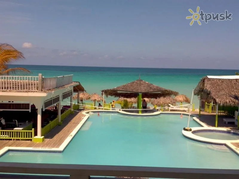 Фото отеля Fun Holiday Beach Resort 3* Негрил Ямайка экстерьер и бассейны