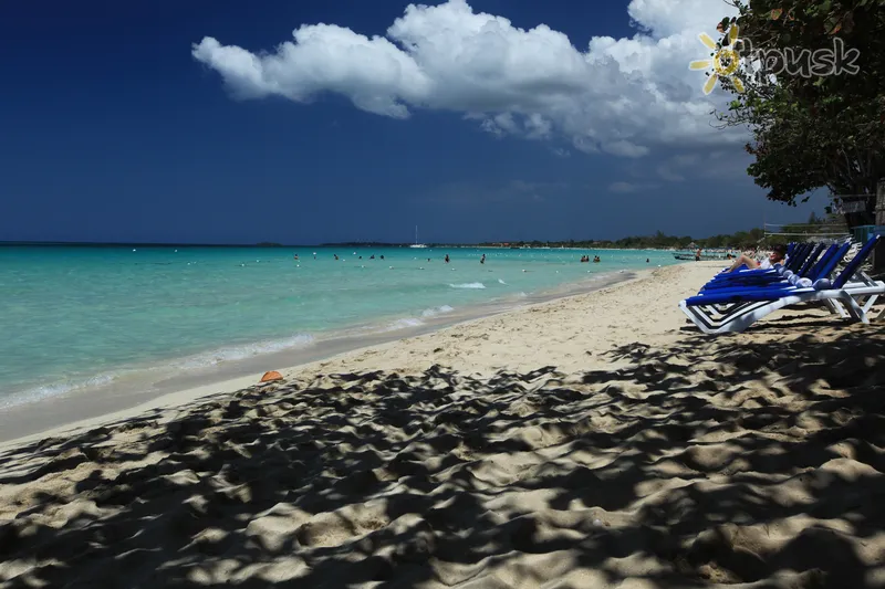 Фото отеля Travellers Beach Resort 4* Negrilis Jamaika papludimys