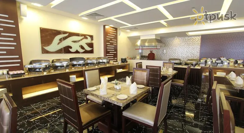 Фото отеля Ivory Grand Hotel Apartments 2* Дубай ОАЭ бары и рестораны