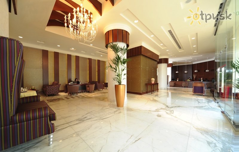 Фото отеля City Seasons Al Hamra Abu Dhabi 4* Абу Даби ОАЭ лобби и интерьер