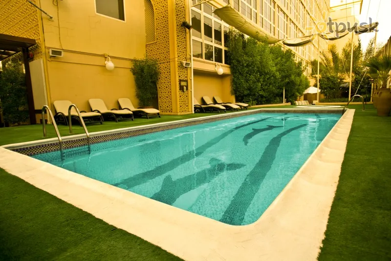 Фото отеля Arabian Courtyard Hotel & Spa 4* Дубай ОАЕ екстер'єр та басейни