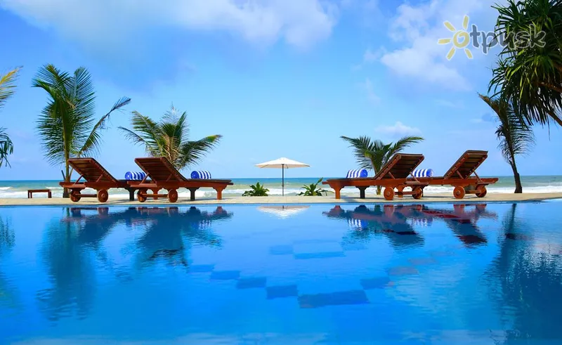 Фото отеля Whispering Palms Hotel 3* Індурува Шрі Ланка екстер'єр та басейни