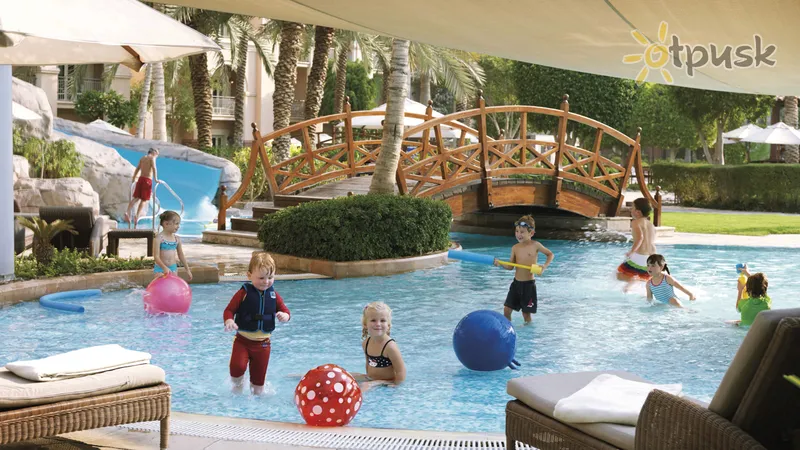 Фото отеля The Ritz-Carlton 5* Dubajus JAE išorė ir baseinai