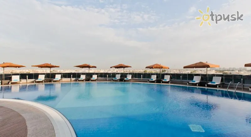 Фото отеля Novotel Abu Dhabi Gate 4* Абу Даби ОАЭ экстерьер и бассейны