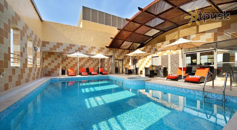 Фото отеля Swiss-Belhotel Corniche 4* Абу Дабі ОАЕ екстер'єр та басейни