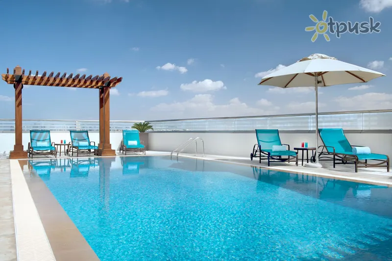 Фото отеля Hilton Garden Inn Dubai Al Muraqabat 4* Dubajus JAE išorė ir baseinai