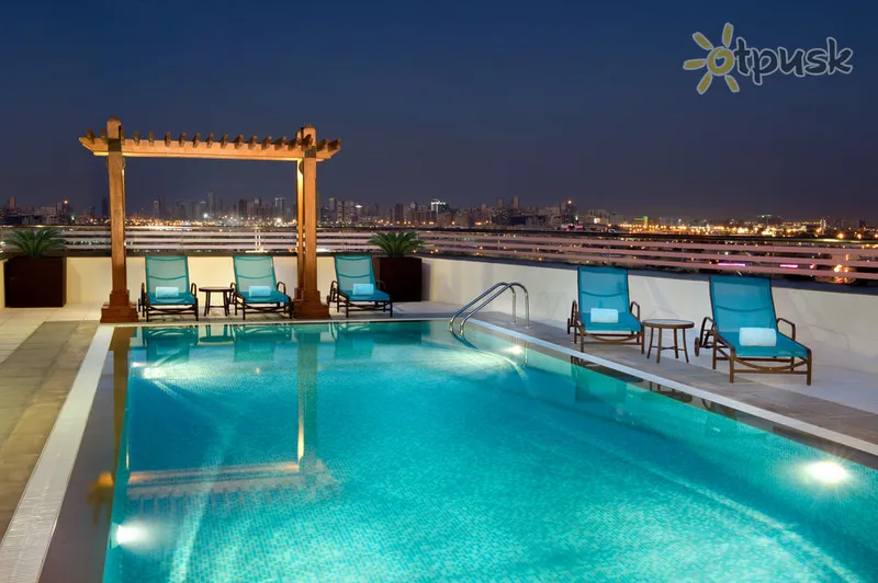Фото отеля Hilton Garden Inn Dubai Al Muraqabat 4* Дубай ОАЕ екстер'єр та басейни