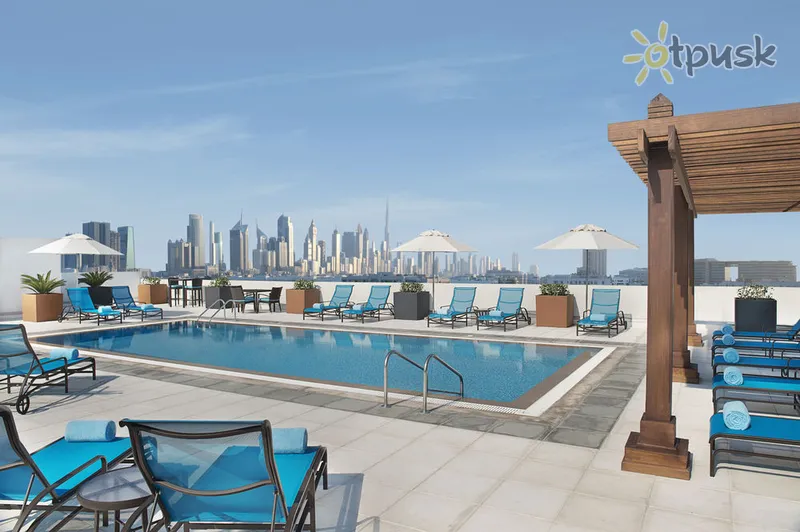 Фото отеля Hilton Garden Inn Dubai Al Mina 4* Дубай ОАЭ экстерьер и бассейны