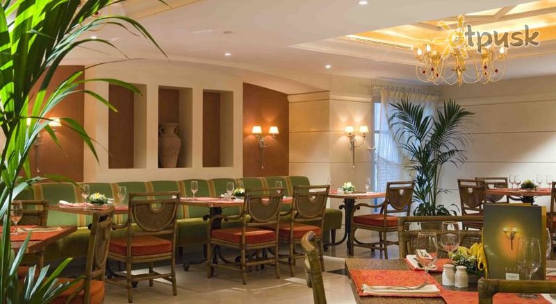 Фото отеля Novel Hotel City Center 4* Абу Даби ОАЭ бары и рестораны