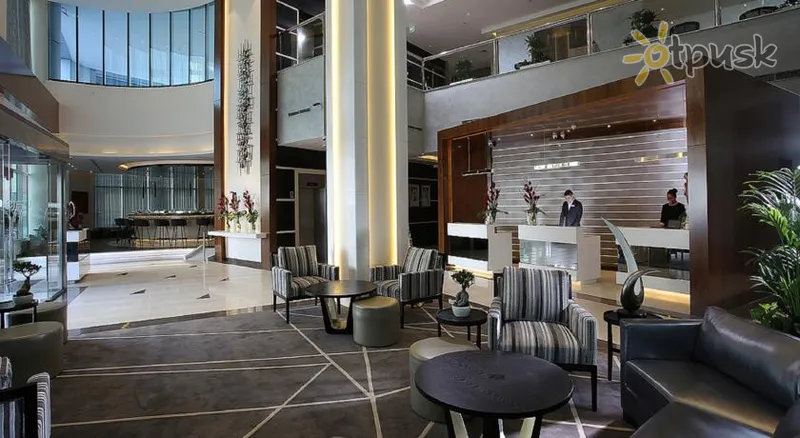 Фото отеля Ramada by Wyndham Dubai Barsha Heights 4* Дубай ОАЭ лобби и интерьер
