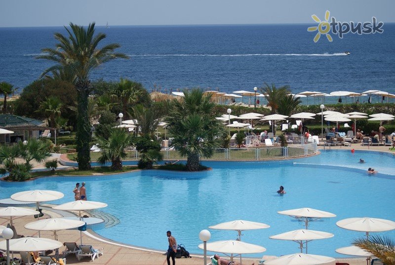 Фото отеля El Mouradi Palm Marina 5* Порт Эль Кантауи Тунис экстерьер и бассейны