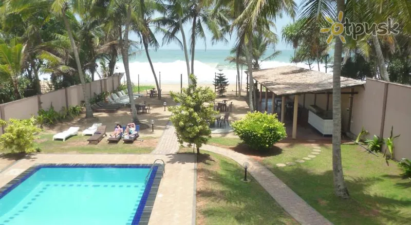 Фото отеля Ocean View Cottage Hotel 3* Хиккадува Шри-Ланка экстерьер и бассейны