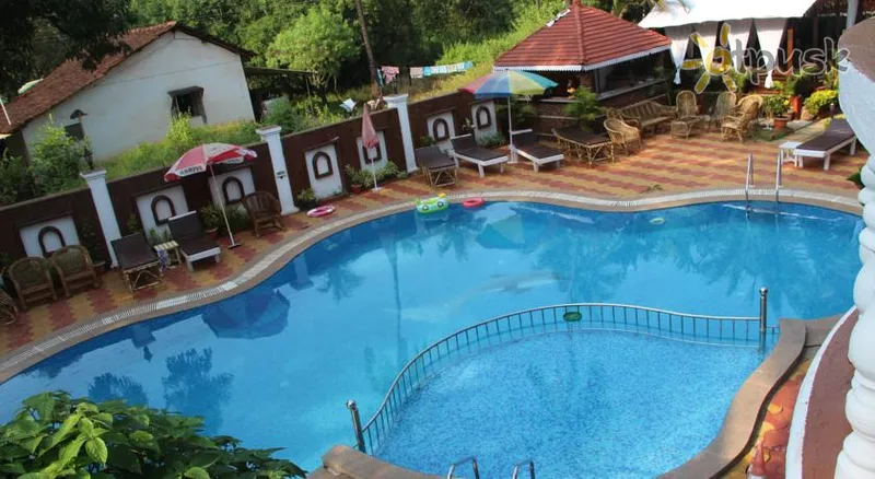 Фото отеля Naga Cottages 2* Šiaurės Goa Indija išorė ir baseinai