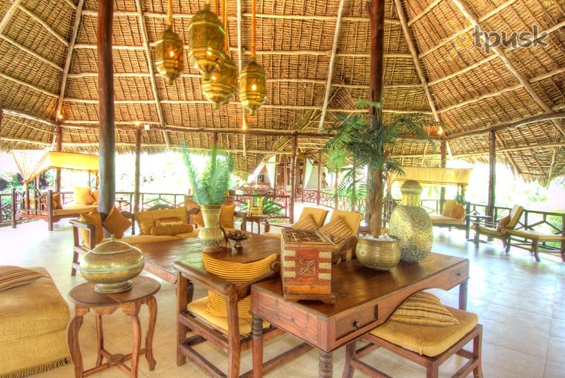 Фото отеля Breezes Beach Club & Spa 5* Бведжу Танзания бары и рестораны