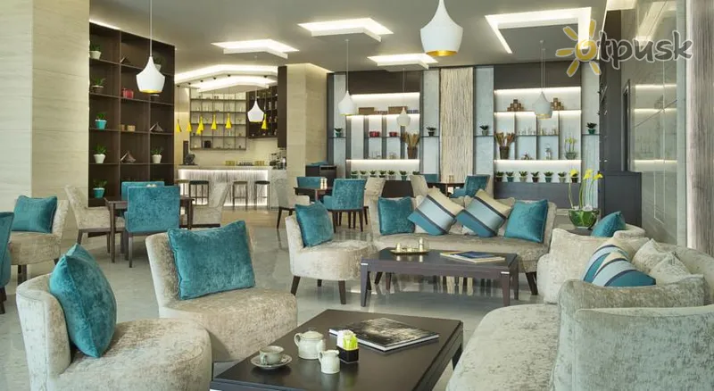 Фото отеля Damac Maison De Ville Breeze 4* Dubajus JAE barai ir restoranai
