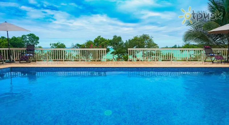 Фото отеля Azao Resort & Spa by Opulent 4* Понгве Танзания экстерьер и бассейны