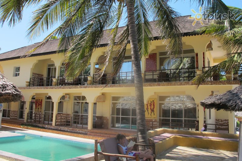 Фото отеля Arabian Nights Villas & Apartments 4* Паже Танзания экстерьер и бассейны
