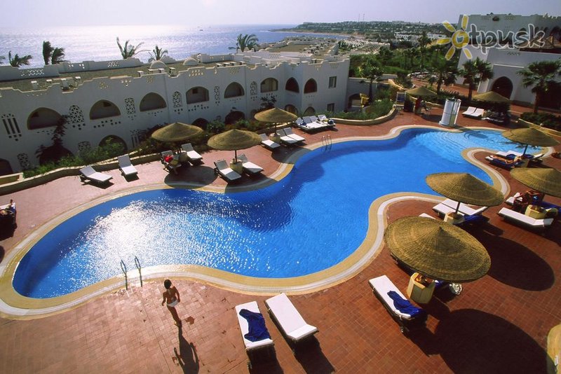 Фото отеля Domina Coral Bay Prestige 5* Шарм эль Шейх Египет экстерьер и бассейны