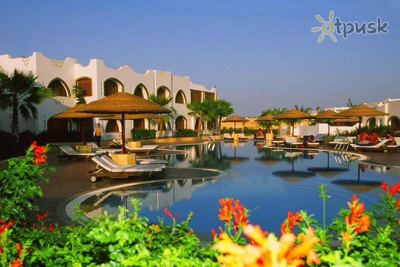 Фото отеля Domina Coral Bay Prestige 5* Шарм эль Шейх Египет экстерьер и бассейны